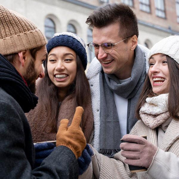 Group of people discussing finances and challenges related to credit score in Canada