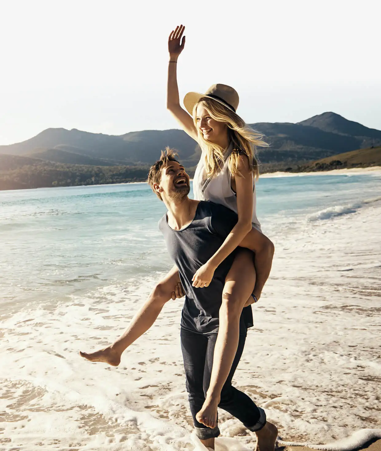 couple enjoying on the beach